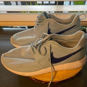 Baby blue Nike shoes